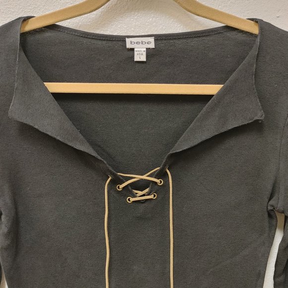 bebe  black cotton top with v neck and leather cord tie up. size L - Picture 2 of 7